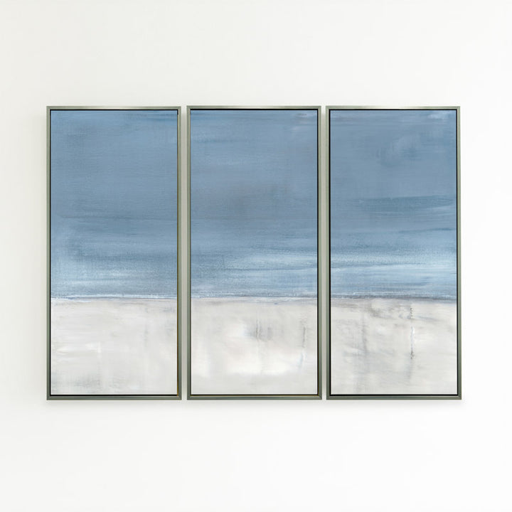 Adrift No. 1 by Carol Benson-Cobb, a set of three vertical canvases featuring serene abstract layers in calming blue-gray hues ideal for a tranquil room design.