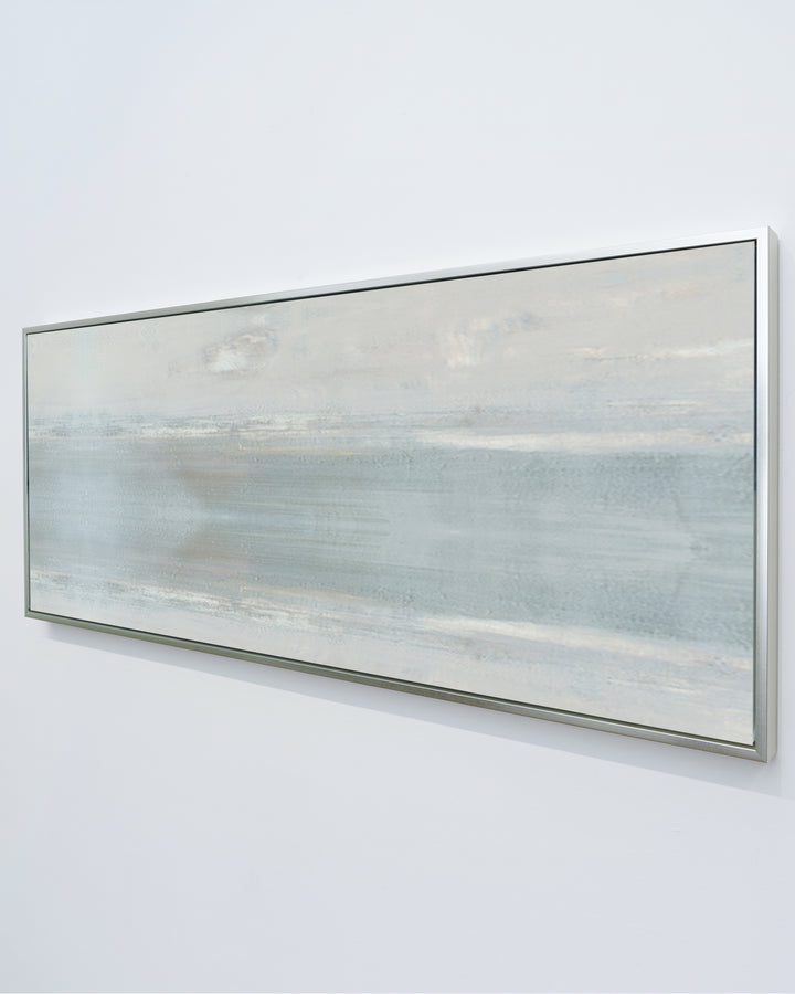 A side view of Anonymity by Carol Benson-Cobb, a horizontal framed canvas showcasing abstract layers of soft neutral tones for a modern, serene living space.