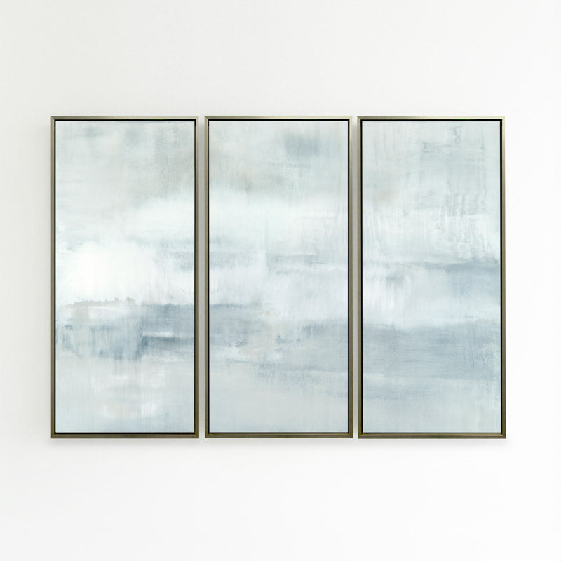 Ascension set of three vertical canvases by Carol Benson-Cobb, featuring soothing gradients of blue, gray, and white ideal modern, minimalist interiors.