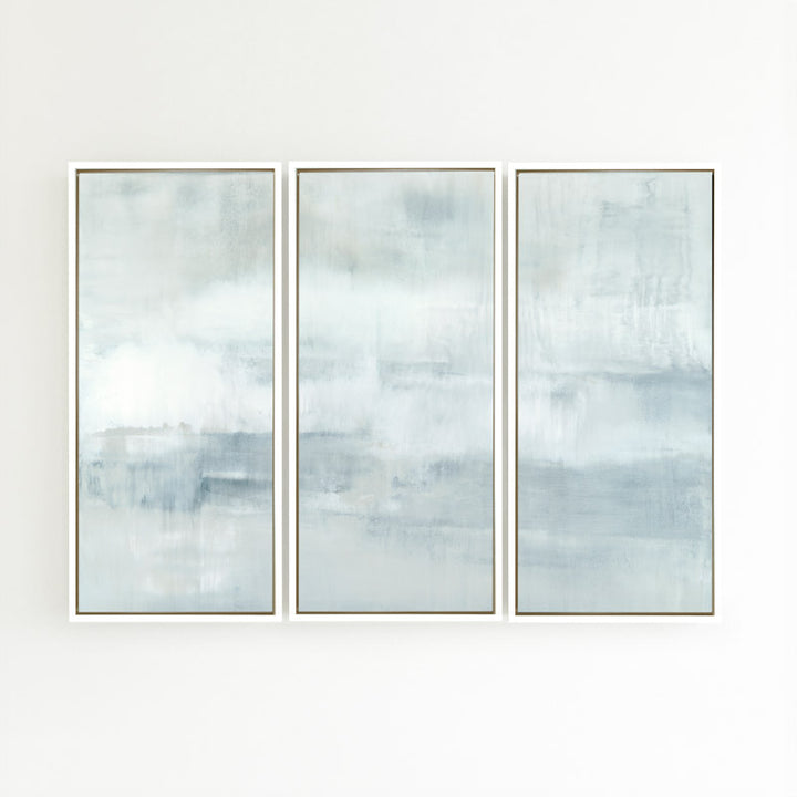 Ascension set of three vertical canvases by Carol Benson-Cobb, featuring soothing gradients of blue, gray, and white ideal modern, minimalist interiors.