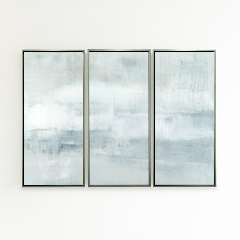 Ascension set of three vertical canvases by Carol Benson-Cobb, featuring soothing gradients of blue, gray, and white ideal modern, minimalist interiors.